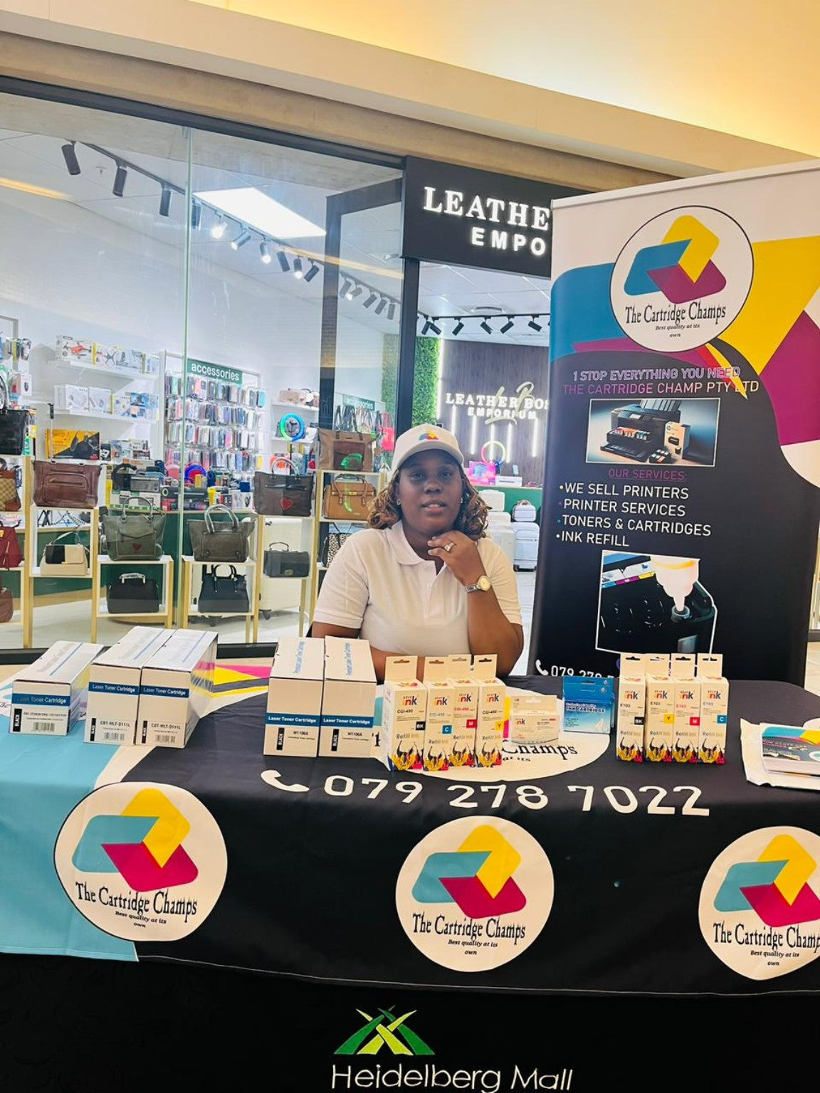 The Cartridge Champ at a product display
